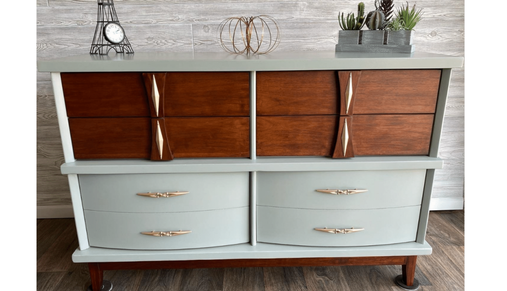 Beautifully refinished antique dresser with exposed walnut and gold handles